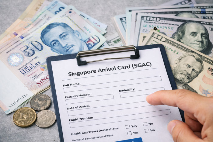Singapore SG Arrival Card price illustrated with form and banknotes